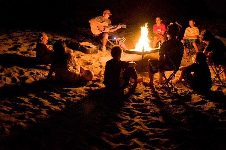 Family enjoying riverside camping in Rishikesh